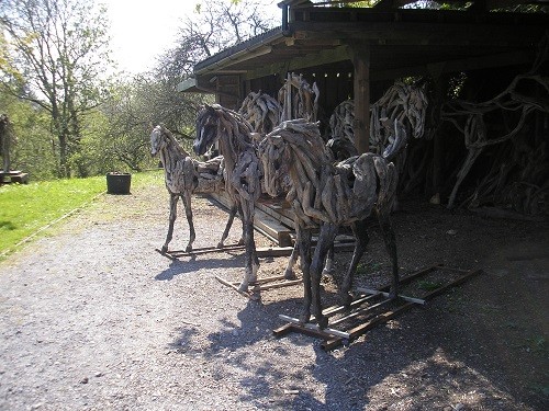 Opposite the stag was the store full of driftwood with a few foals in front.